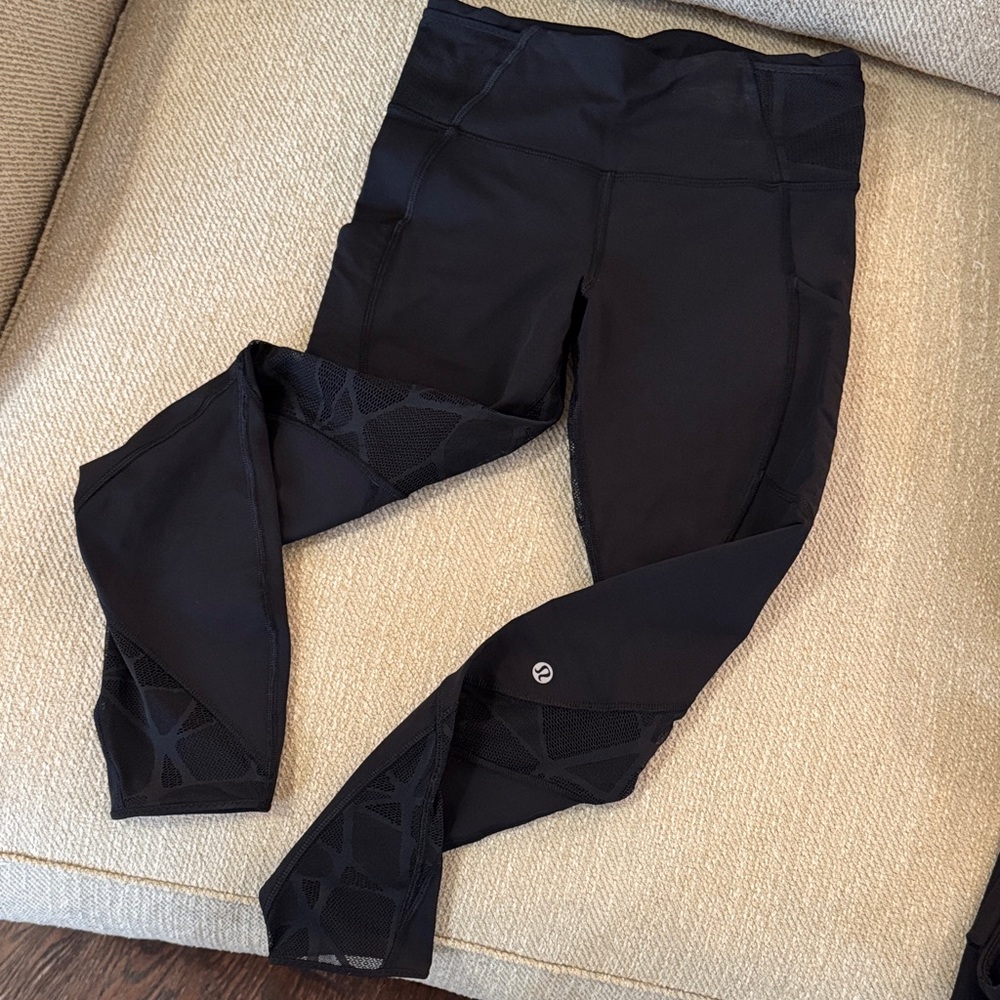 Lulu Lemon - Black Leggings with mesh sided legs. Super stylish and so cute!